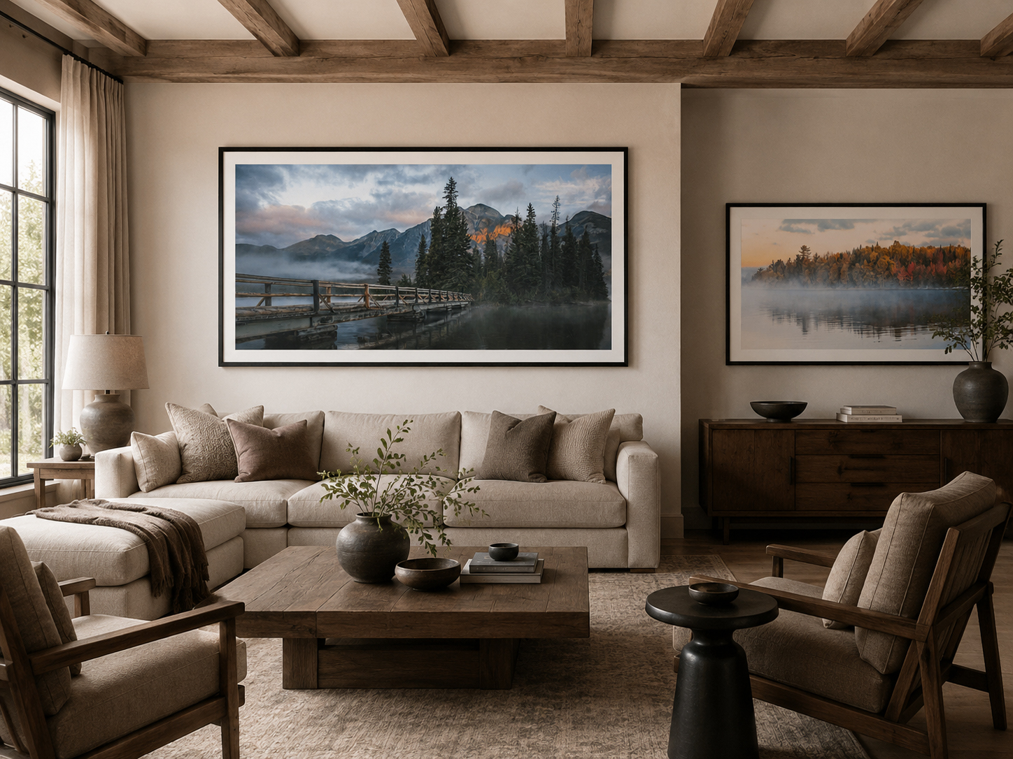 Quiet luxury living room with two coordinated framed landscape photographs curated by Dan Sproul for an interior design project